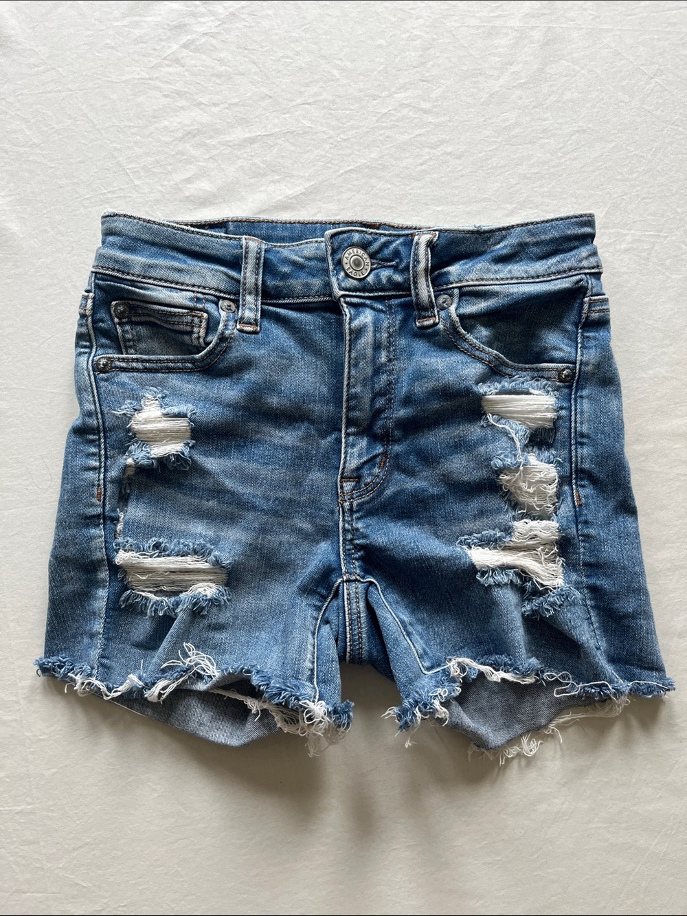 American Eagle Outfitters Blue Distressed Next Level Stretch Hi-Rise Shortie